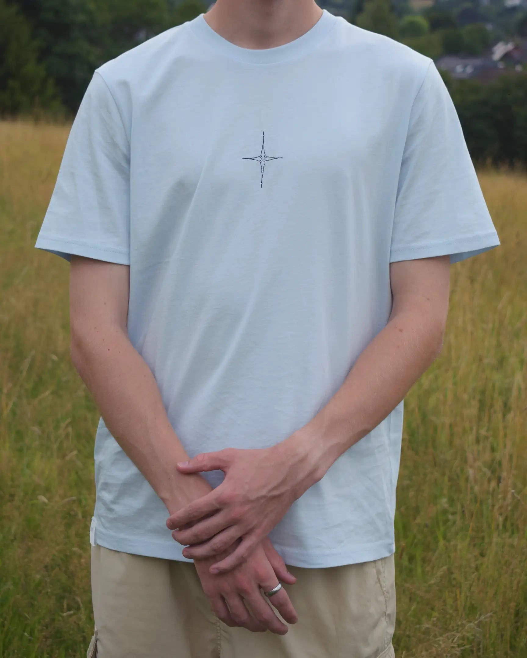 star embroidery tshirt compass design front view