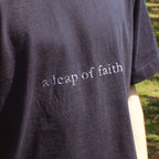 'A LEAP OF FAITH' HEAVYWEIGHT TEE IN BLACK